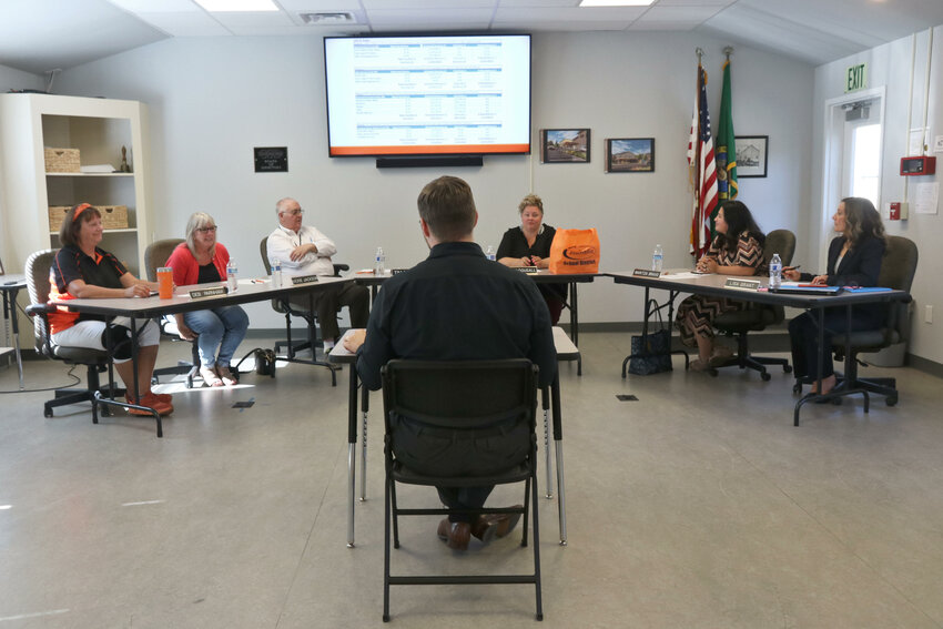 Joe Vetter, the Centralia School District&rsquo;s executive director of fiscal services and operations, presents the draft 2023-24 budget to the Centralia School Board during a public hearing in the district&rsquo;s board room on Wednesday, July 26.