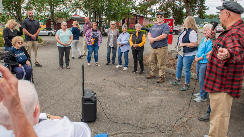 Attendees at a &ldquo;prayer circle&rdquo; event hosted by Elizabeth Rohr confront Lewis County Seniors President Carol Brock about recent rule changes that prohibit praying aloud at the senior centers on Monday, Aug. 7, outside the Twin Cities Senior Center.