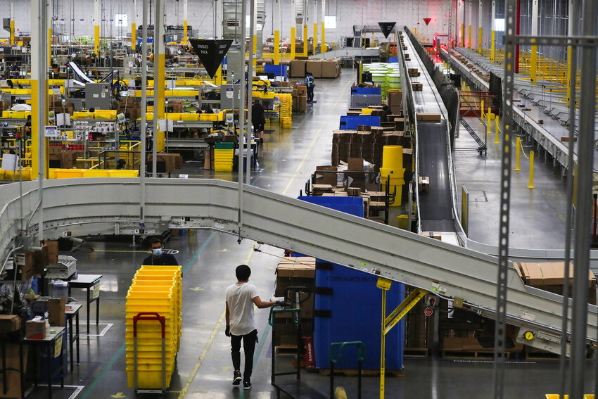 Washington&rsquo;s Department of Labor and Industries cited Amazon four times over worker health and safety in its warehouses, including this facility in Kent. Amazon and L&amp;I went to trial in July to determine whether Amazon must make changes to its operations. (Ken Lambert/The Seattle Times/TNS)