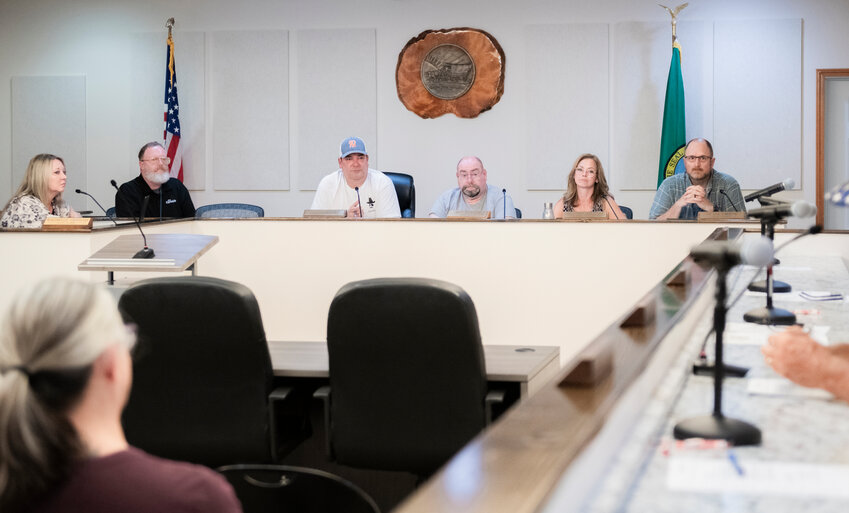 From left, Napavine clerk Rachelle Denham, City Councilor Brian Watson, Mayor Shawn O&rsquo;Neill, Councilors Don Webster and Heather Stewart, and Mayor Pro-Tem Duane Crouse listen to reports by city staff during a meeting on Tuesday night.