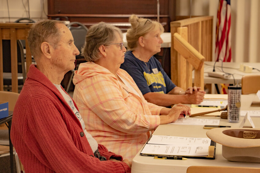 FILE PHOTO &mdash;&nbsp;Lewis County Seniors board members Ron Averill, Carol Brock and Judy Barr listen during public comments concerning the nonprofit's new prayer and politics ban during a board meeting at the Twin Cities Senior Center on Thursday, Aug. 10.