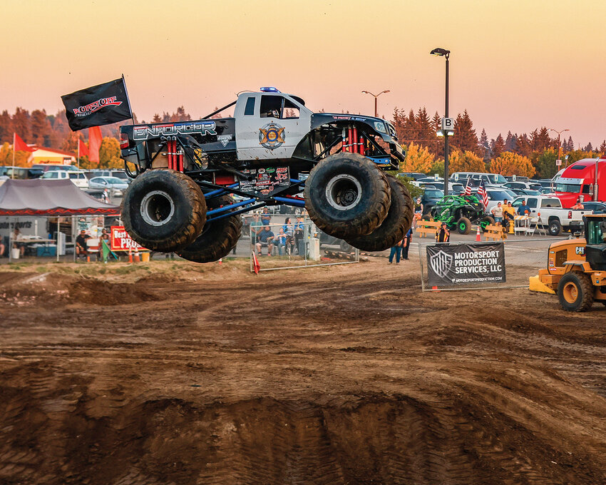 Monster truck Enforcer flies high over the table top jump on the way to winning the freestyle run during the last day of the Clark County Fair on Sunday, Aug. 13.