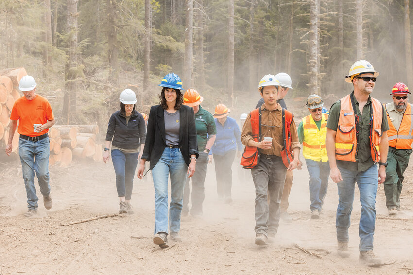 Congresswoman Marie Gluesenkamp Perez tours a timber sale with environmental groups, crews from the Department of Natural Resources, U.S. Forest Service officials and concerned citizens in the Gifford Pinchot National Forest on Thursday, Aug. 10.