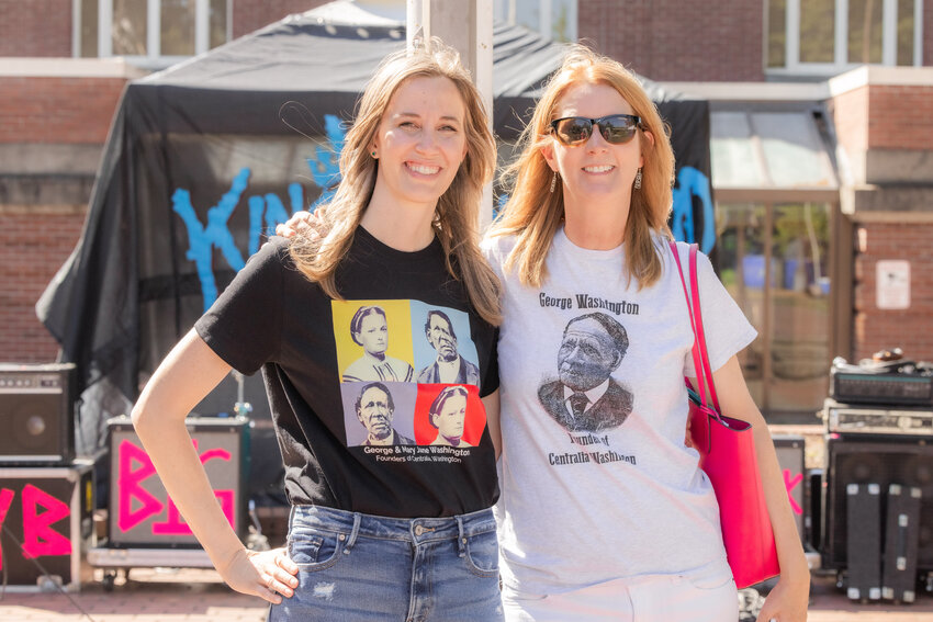 Sarah Althauser and Kelly Smith Johnson smile while sporting George Washington shirts on Founder's Day at George Washington Park on Saturday, Aug. 12 in Centralia.