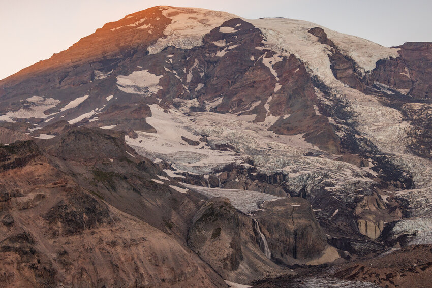 Sunlight illuminates Mount Rainier at sunset near Paradise on Tuesday, Aug. 15, 2023.