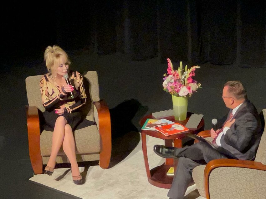 Country music legend Dolly Parton is interviewed by Washington state Superintendent of Public Instruction Chris Reykdal Tuesday in this photo provided by the United Way of Lewis County.