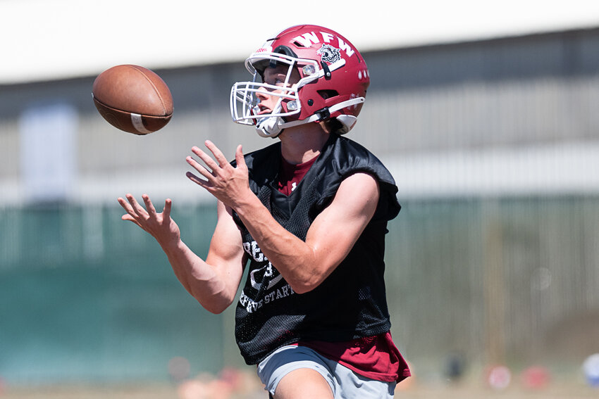 Beau Guyette makes a catch during during W.F. West's practice to open training camp on Wednesday, Aug. 16.