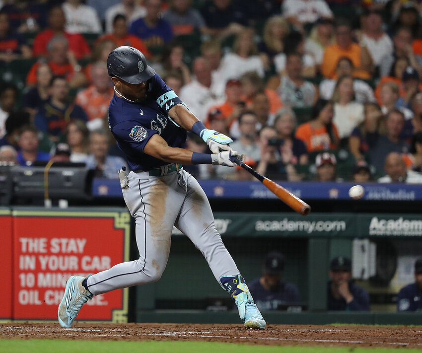 Julio Rodriguez of the Seattle Mariners singles in the fifth inning against the Houston Astros at Minute Maid Park on August 18, 2023 in Houston, Texas. (Photo by Bob Levey/Getty Images (TNS)