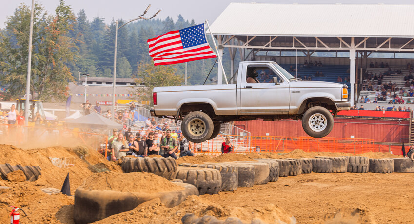 Trevor Graves, of Napavine, jumps his Ford Ranger at the Southwest Washington Fairgrounds during the &ldquo;Jump Your Junk&rdquo; event on Sunday, Aug. 20. The event was stopped after this jump and Graves was taken to the hospital with unknown injuries after walking from his truck to a paramedic unit on the scene.