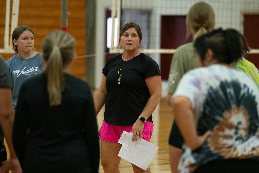 Tiffany Alvarado talks to her team at the end of W.F. West's first practice, on Monday, Aug. 21.