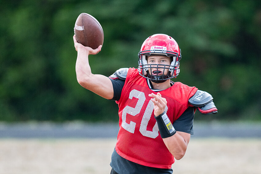 Easton Kolb throws a screen pass during Mossyrock's practice on Tuesday, Aug. 22.