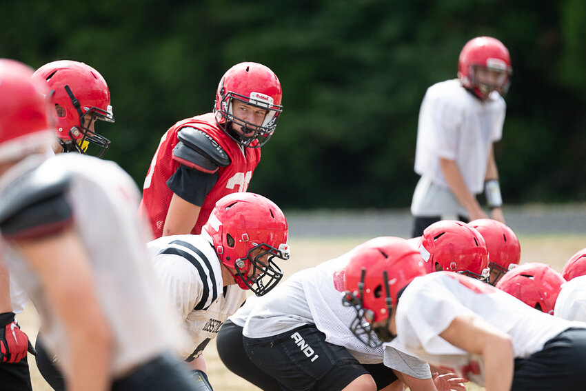 Easton Kolb looks over the formation at Mossyrock's practice on Tuesday, Aug. 22.