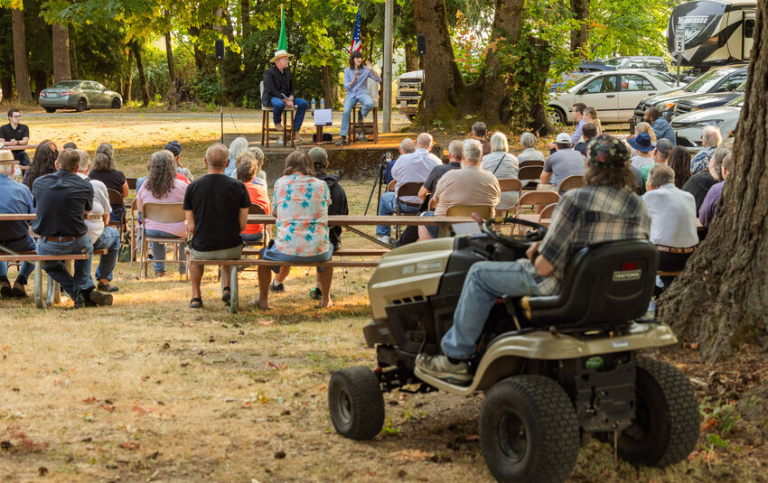 Brian Haight, of Toledo, drove his lawn mower to watch Congresswoman Marie Gluesenkamp Perez speak at Kemp Olson Memorial Park during a town hall event on Wednesday, Aug. 23.