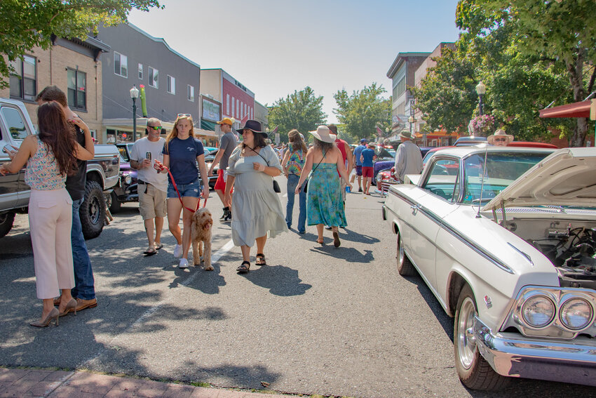 Attendees wander up and down Tower Avenue in downtown Centralia for the Hub City Car Show on Saturday, Aug. 26.