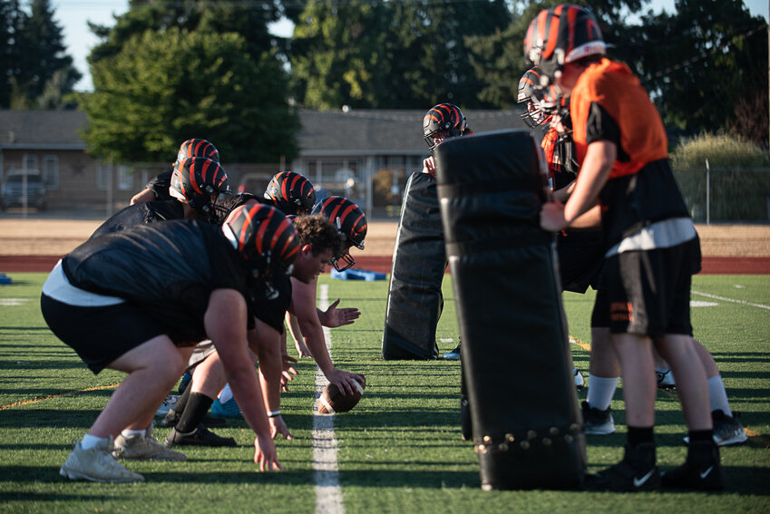 The Centralia Tigers offensive line lines up in formation during Centralia's first practice on Aug. 16.