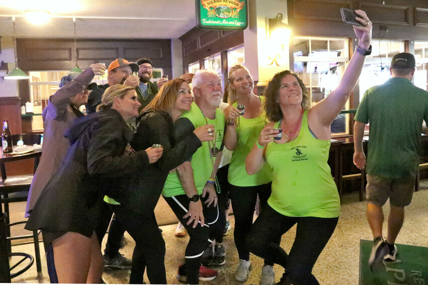 Run Amok Irish Running Club members take a selfie at O&rsquo;Blarney&rsquo;s Irish Pub in Centralia at the start of the club&rsquo;s Fifth Annual Pub Run on Thursday, Aug. 31.