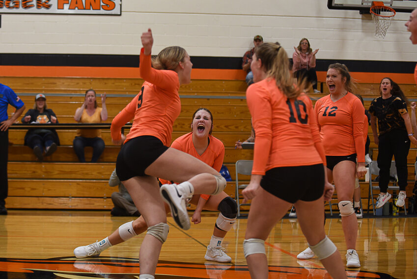 Kiera O'Neill (9) celebrates with her teammates after sealing Napavine's victory over Toutle Lake on Sept. 11.