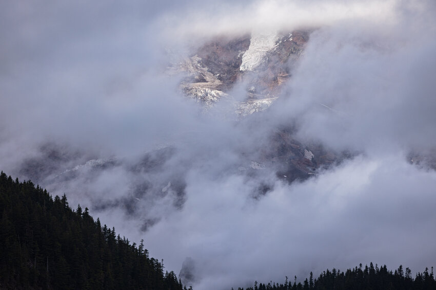 Clouds shroud Mount Rainier on Tuesday, Sept. 12.