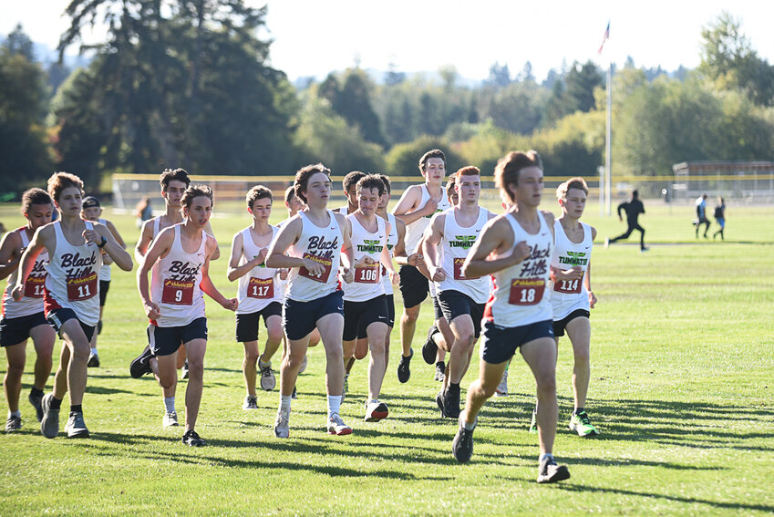 The Black Hills and Tumwater boys cross country teams begin their race at Pioneer Park on Sept. 13.