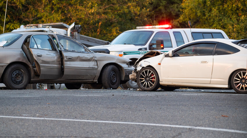 Emergency crews respond to the scene of a crash along U.S. Highway 12 at the intersection of Kehoe Road in Randle on Wednesday, Sept. 21.