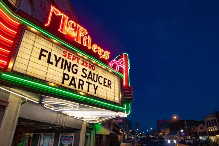 McFiler's Chehalis Theater's marquee is illuminated on Friday, Sept. 22 announcing the Chehalis Flying Saucer Party in downtown Chehalis.