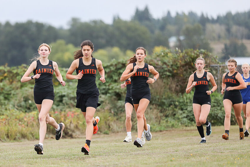Six Rainier runners surge to the front of the pack early in a Central 2B League race at Adna on Sept. 28.