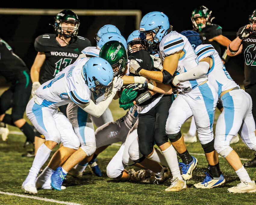 It took a village of Hockinson Hawks to stop Woodland&rsquo;s Elijah Andersen in the run game as he rushed for 181 yards in the Beavers&rsquo; 40-21 win on Friday, Sept. 29.