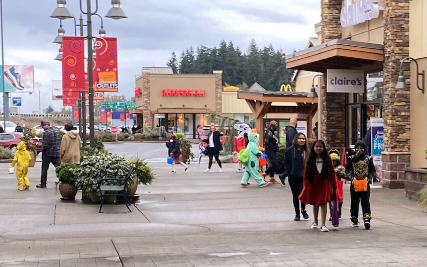 People trick-or-treat at the Centralia Outlets in this photo provided to The Chronicle.