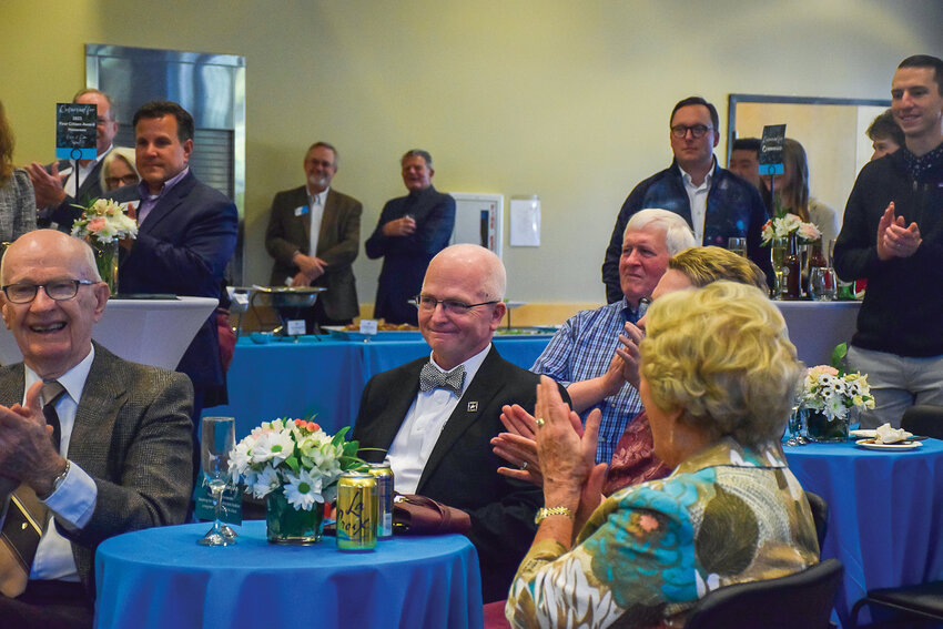 Battle Ground Mayor Philip Johnson hears his name read as the Greater Vancouver Chamber&rsquo;s 2023 statesperson of the year during a ceremony at the Battle Ground Community Center Oct. 5.