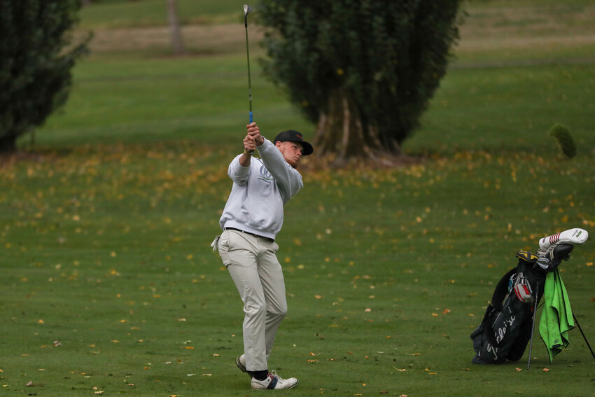 Von Wasson chips onto the green during a matchup between Centralia and W.F. West at Newaukum Golf Course on Oct. 9.