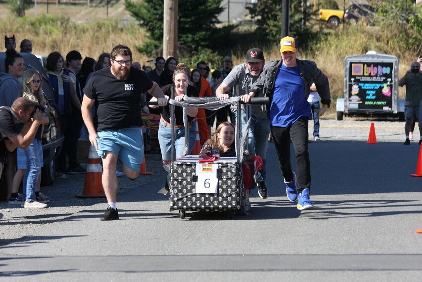 The Chronicle&rsquo;s DEADline News Team rolls down Seventh Street in Bucoda in October 2022. From left are Chronicle reporters Owen Sexton and Emily Fitzgerald, Assistant Editor Isabel Vander Stoep, Editor Eric Schwartz and Photo Editor Jared Wenzelburger. The team came in third.
