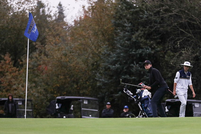 David Dallaire watches as his put approaches the flag during his round on the second day of the 1A Evergreen Championship on Oct. 17.