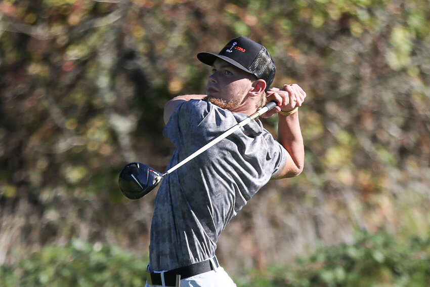 Von Wasson tees off on hole 18 during the 2A Evergreen Championships on Oct. 18.