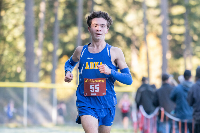 Adna's Jordan Stout comes in to finish first in the 1B/2B District 4 boys cross country championship, Oct. 28 in Rainier.