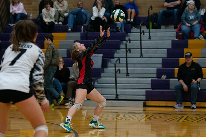 Lyndzie Filla fends off a tough serve during Toledo's loss to Forks in the district tournament on Nov. 1 in Napavine.