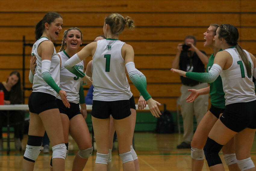 The Thunderbirds celebrate a point during Tumwater's win over Washougal in the first round of the 2A District 4 tournament on Nov. 2.