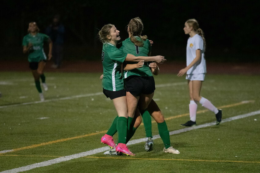 Tumwater players celebrate Emalyn Shaffer's goal to open the scoring in the first half of Tumwater's 4-1 win over Aberdeen in a loser-out match in the 2A District 4 tournament, Nov. 2 at Tumwater District Stadium.