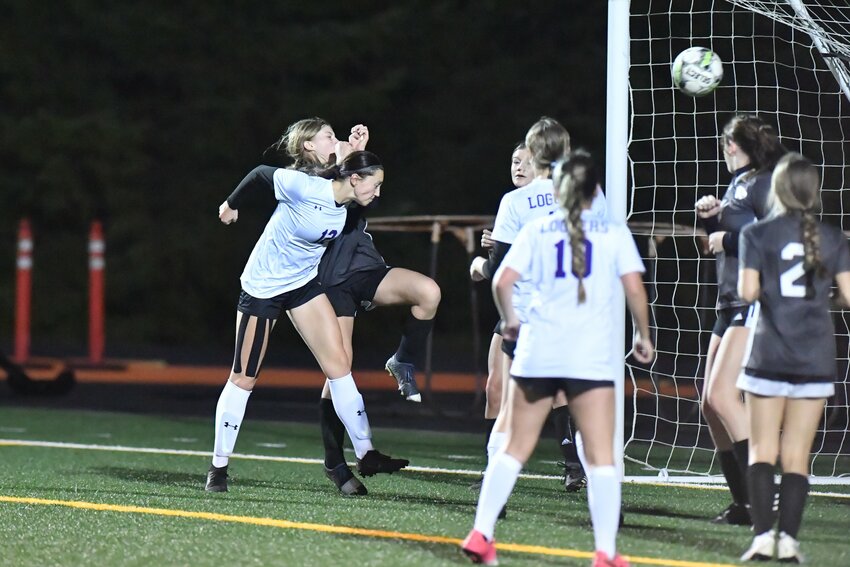 Onalaska's Jules Auman delivers a header off a corner kick in the 70th minute to provide the game-winning goal for the Loggers in a 1-0 win over Napavine in the 2B district semifinal on Thursday, Nov. 2.