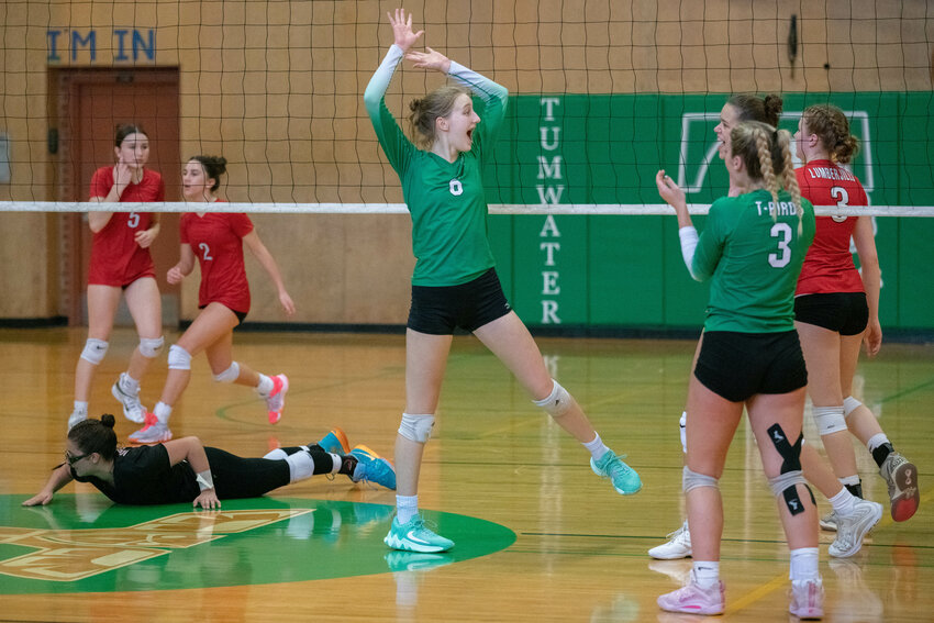 Whitney Van Gorkom celebrates a kill during Tumwater's three-set win over R.A. Long in a winner-to-State match at the 2A District 4 Tournament on Nov. 4.