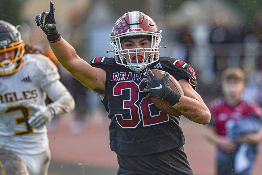 Declan Mcdonald celebrates on his way to the endzone during a 35-14 W.F. West win over Hudson's Bay Nov. 4.