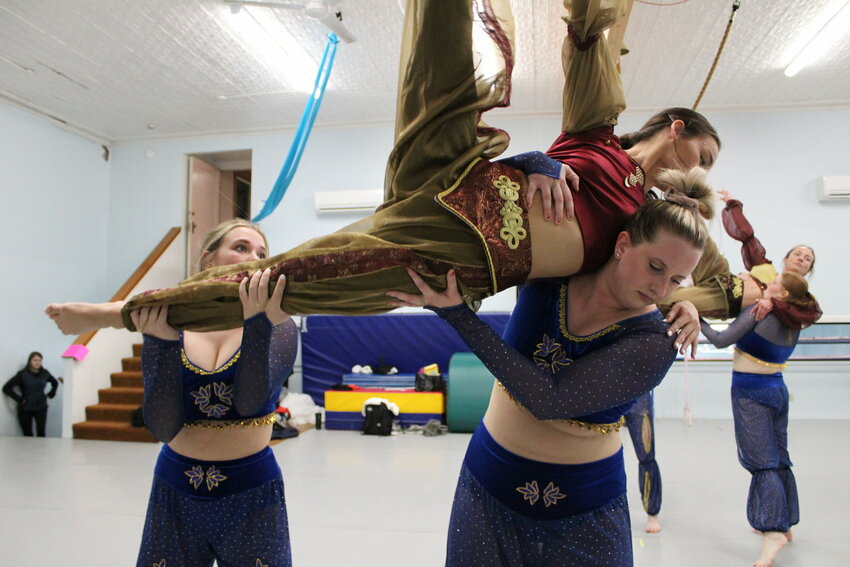 Erin Jennings and Christina Hill lift Arabian princess Myah O'Neill during a rehearsal for the Arabian Corps portion of &quot;The Nutcracker&rdquo; in this 2022 Chronicle file photo.