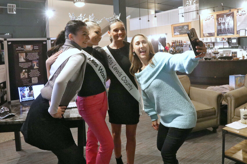 Miss Washington Teen Director Krystle Ochsner Ramos takes a selfie with Miss Lewis County Myah O&rsquo;Neill, Miss Thurston County&rsquo;s Teen Emma Adams, and Miss Washington&rsquo;s Teen Emily Hamilton at The Station in Centralia on Sunday, Nov. 5.