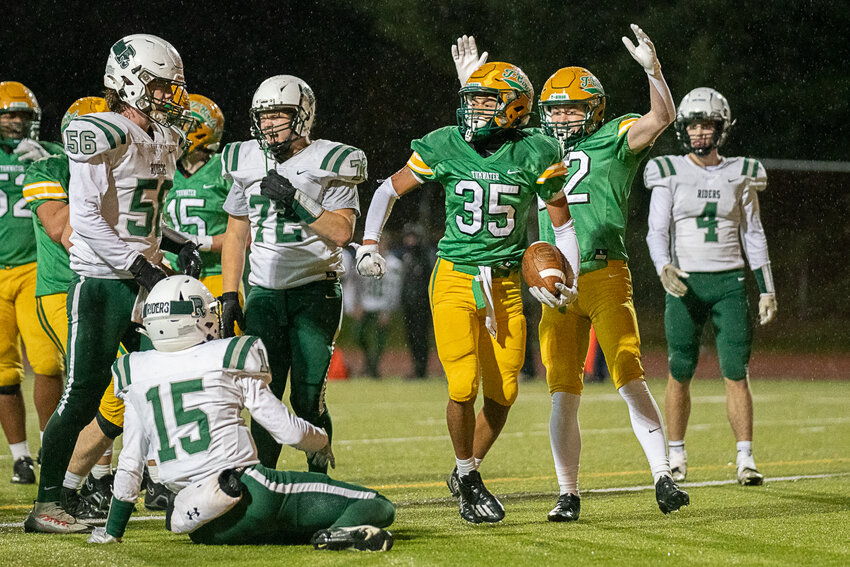 Kooper Clark celebrates his second touchdown of the night during Tumwater's 70-12 win over Port Angeles in the first round of the 2A state tournament on Nov. 10.