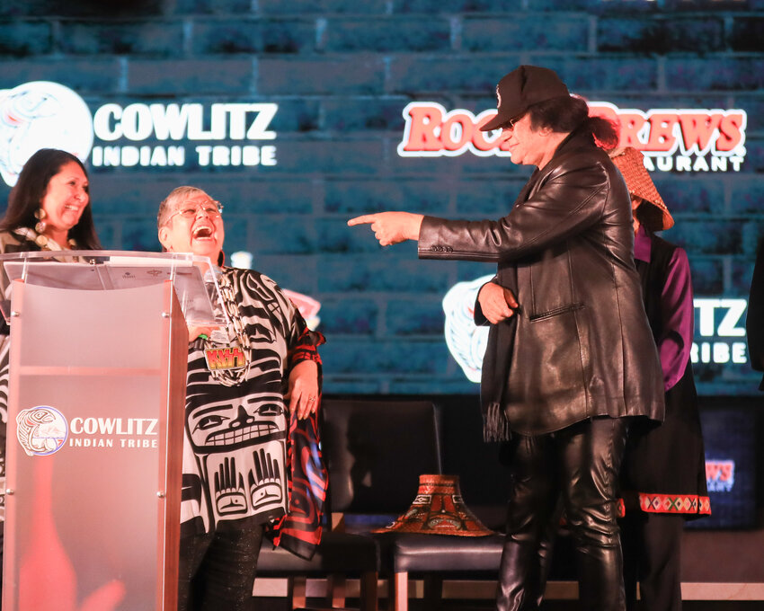 Rock and Brews co-founder and Kiss bassist and co-lead singer Gene Simmons points and shares a laugh with Patty Kinswa-Gaiser, chairwoman of the Cowlitz Indian Tribe, during the groundbreaking ceremony for the upcoming restaurant at ilani Casino on Tuesday, Nov. 7.