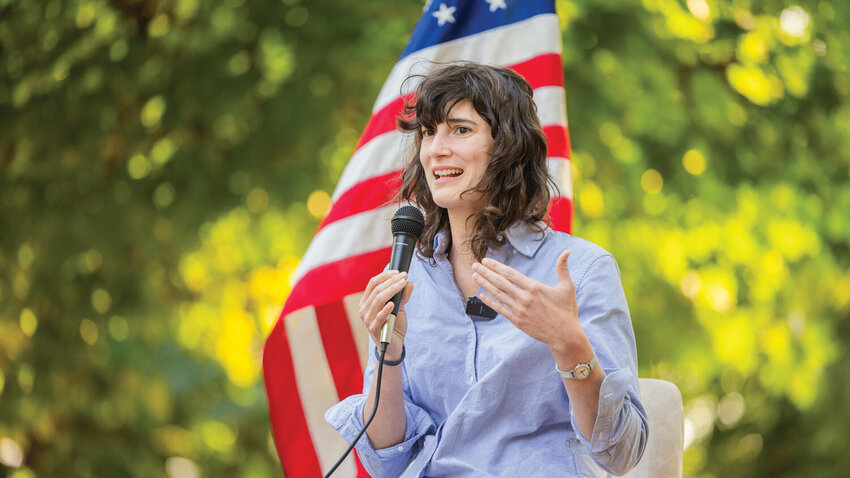 Congresswoman Marie Gluesenkamp Perez talks to visitors at Kemp Olson Memorial Park in Toledo during a town hall event on Wednesday, Aug. 23, 2023.