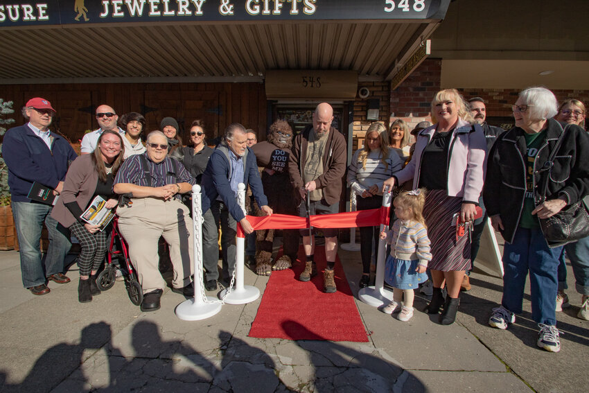 Bigfoot Treasure owner Mitch Moberg officially cuts the ribbon during a ceremony for his store in downtown Chehalis. The ceremony was hosted by the Centralia-Chehalis Chamber of Commerce.  The business is located at 548 N. Market Blvd. in downtown Chehalis. Look for a feature article on the business in an upcoming edition of The Chronicle.