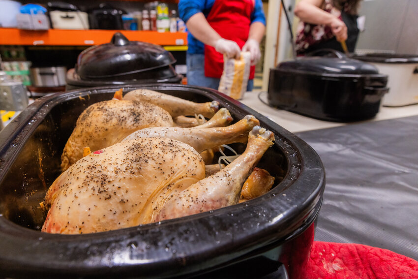 Turkeys are prepped for free meals served on Thanksgiving at The Gather Cafe in Centralia on Thursday, Nov. 23.