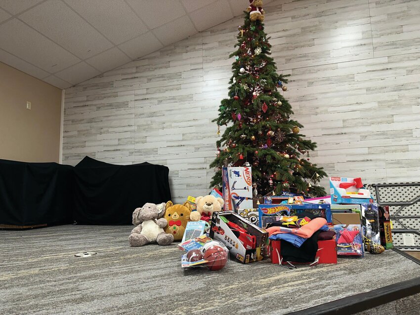 Yelm football&rsquo;s toy donation sit in front of a Christmas tree on Nov. 24 at the Nisqually Valley Moose Lodge in Yelm.