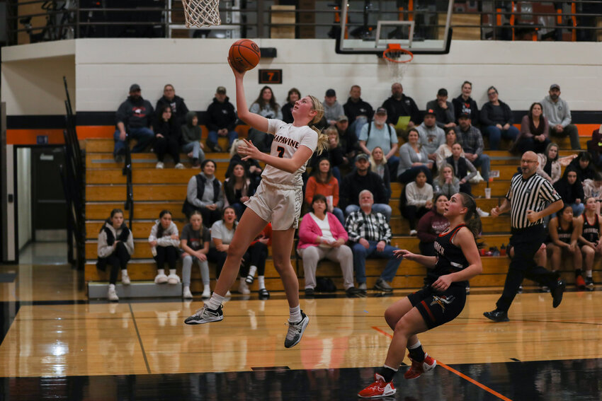 Hayden Kaut puts up a layup in transition during the first half of Napavine's game against Mossyrock on Nov. 30.