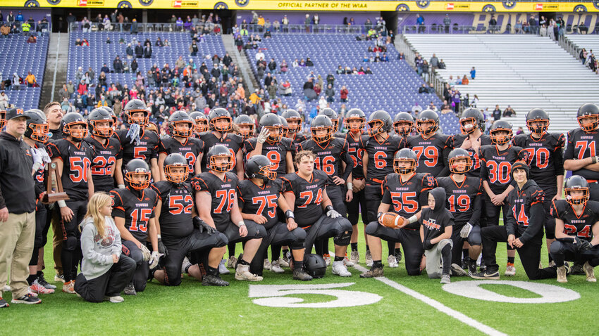 The Napavine Tigers pose for a photo after falling to Okanogan 28-24 in the 2B State Championship game at Husky Stadium on Saturday, Dec. 2, 2023.